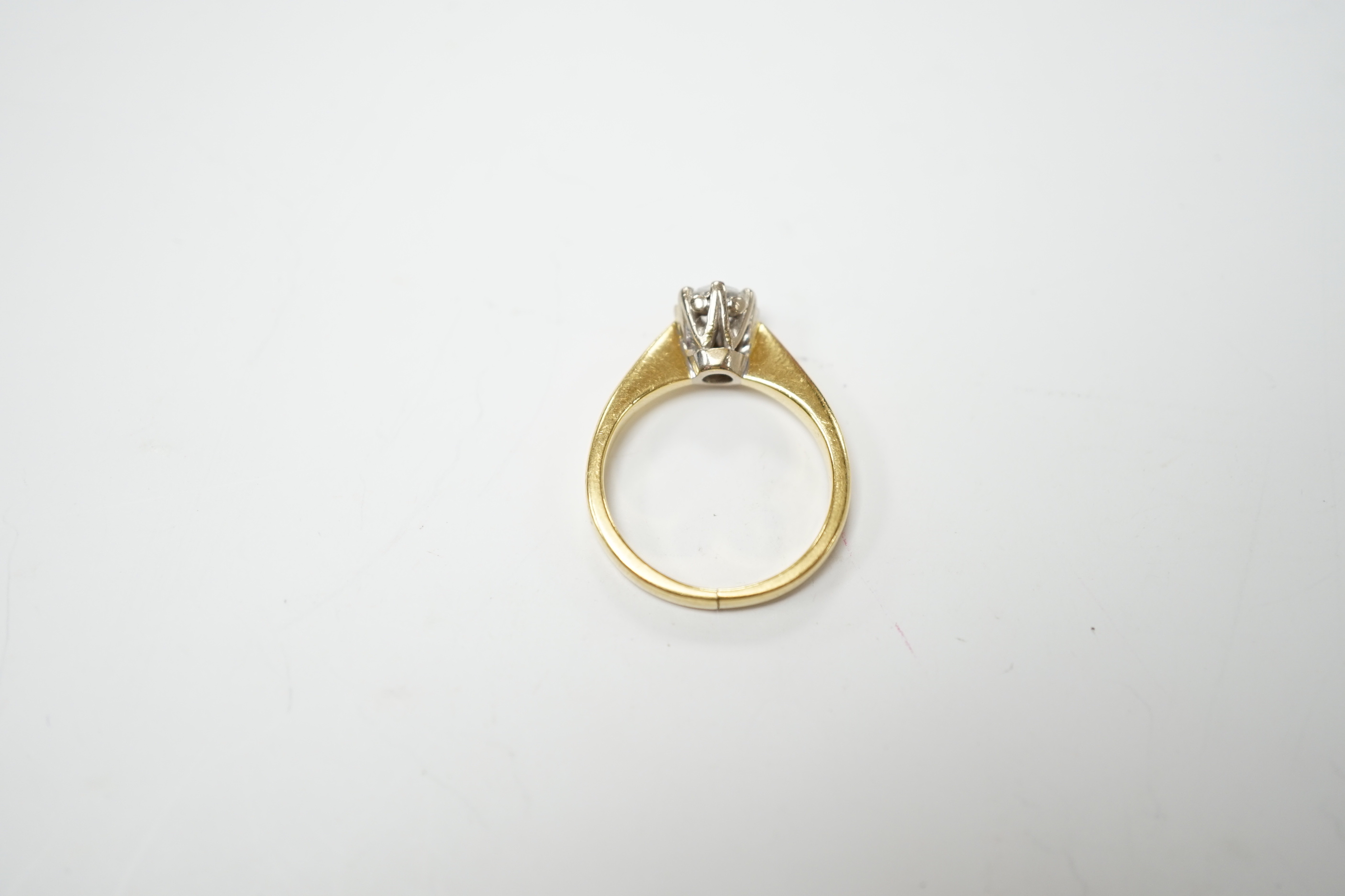 A modern 18ct gold and solitaire diamond set ring, the stone weighing 0.33ct, size I, gross weight 4.2 grams.